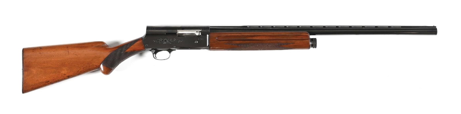 (C) BROWNING A5 SEMI-AUTOMATIC SHOTGUN.: Made in Belgium in 1953 but the barrel is a later made in Japan piece. Standard blue finish, lightly engraved receiver, full vent rib, removeable choke, round knob checkered pistol grip walnut stock, 