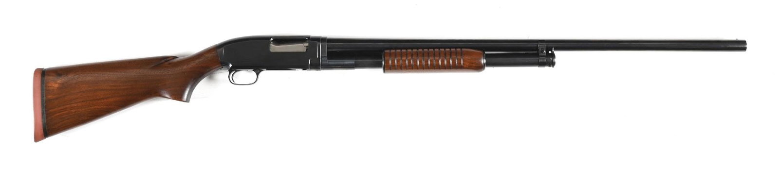 (C) HIGH CONDITION WINCHESTER MODEL 12 SUSPER X 12 GAUGE SLIDE ACTION SHOTGUN (1952): Dates to 1950. Standard features include blue finish, take down, single bead front sight, plain pistol grip walnut stock with solid red Winchester butt pad and grooved flat bottom forearm. CONDITION: 