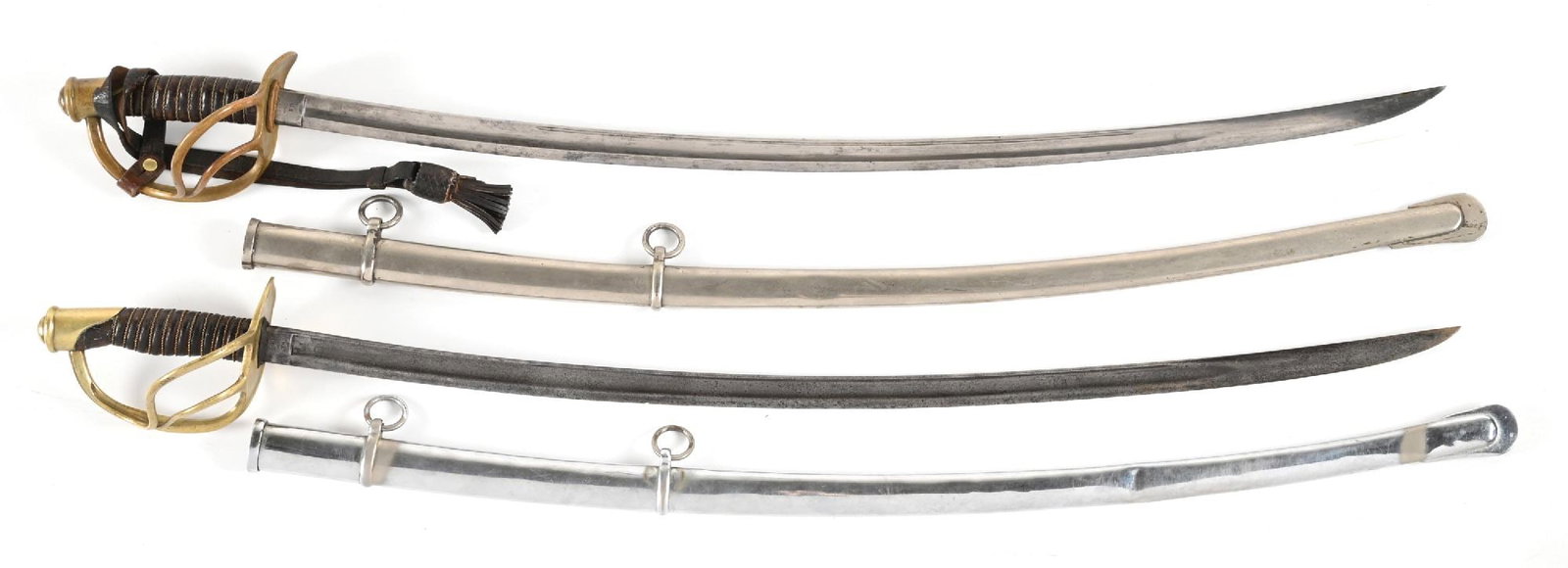 LOT OF 2: US CIVIL WAR MODEL 1860 CAVALRY SABERS.: Lot consists of: (A) Civil War Model 1860 cavalry saber marked "C. ROBY / W. CHELMSFORD / MASS" and "U.S. / 1865 / A.G.M." on the ricasso. Blade exhibits a gray patina throughout with scattered blemis