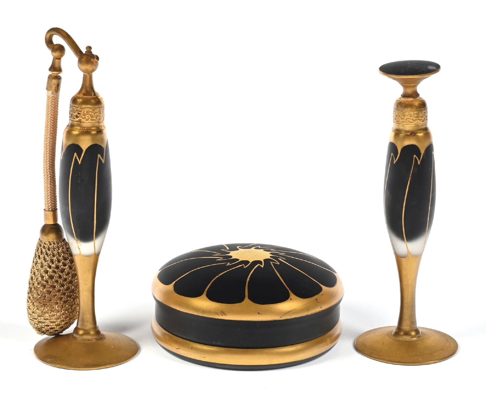 LOT OF 3: BLACK & GOLD DEVILBISS PERFUMES AND POWDER BOX SET: C. 1920s. A spectacular matte black and gold Art Deco style signed DeVilbiss vanity set, including two perfumes and a lidded powder box. The perfumes have gold-toned hardware with typical aging. The a