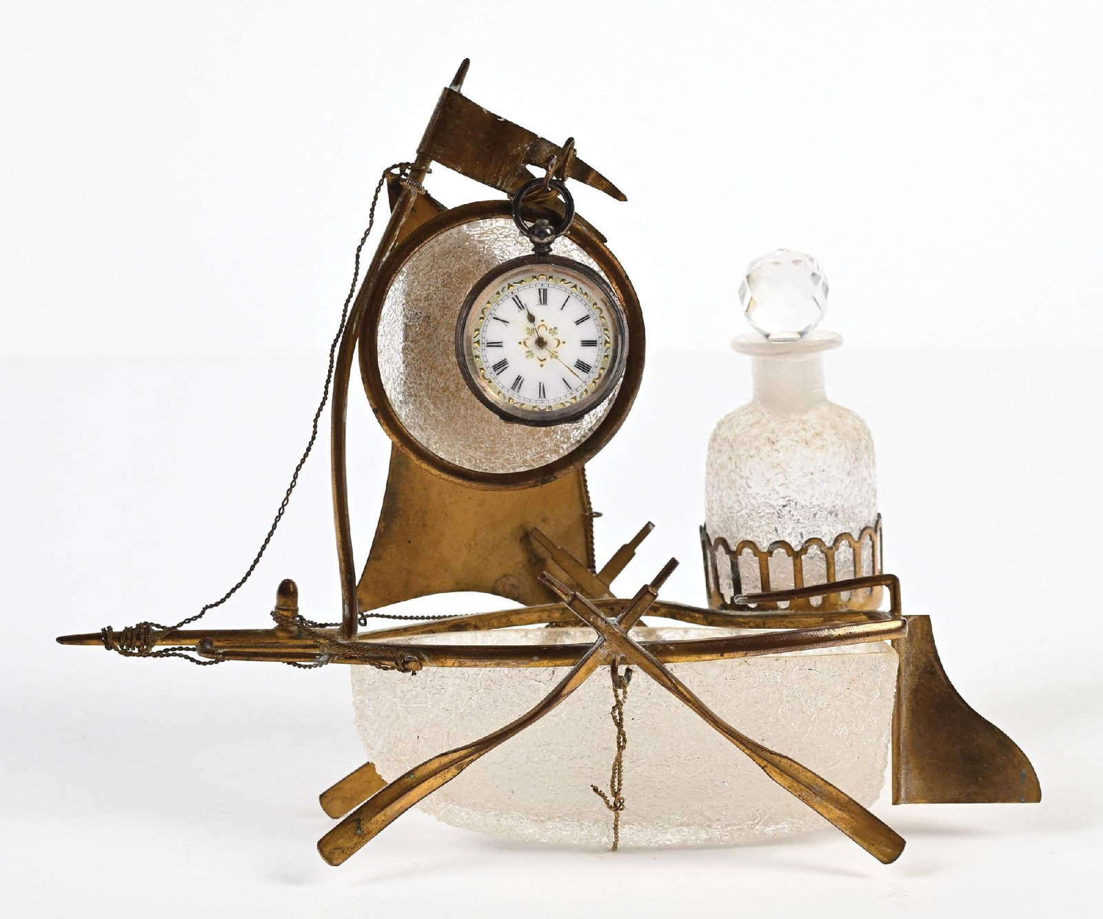 FRENCH CRACKLE GLASS SAILBOAT VANITY SET: C. 1800s. A gorgeous crackle glass perfume vanity set in the shape of a sailboat and includes a glass perfume, trinket tray, and time piece on a brass stand. The crackle glass trinket box and perfume