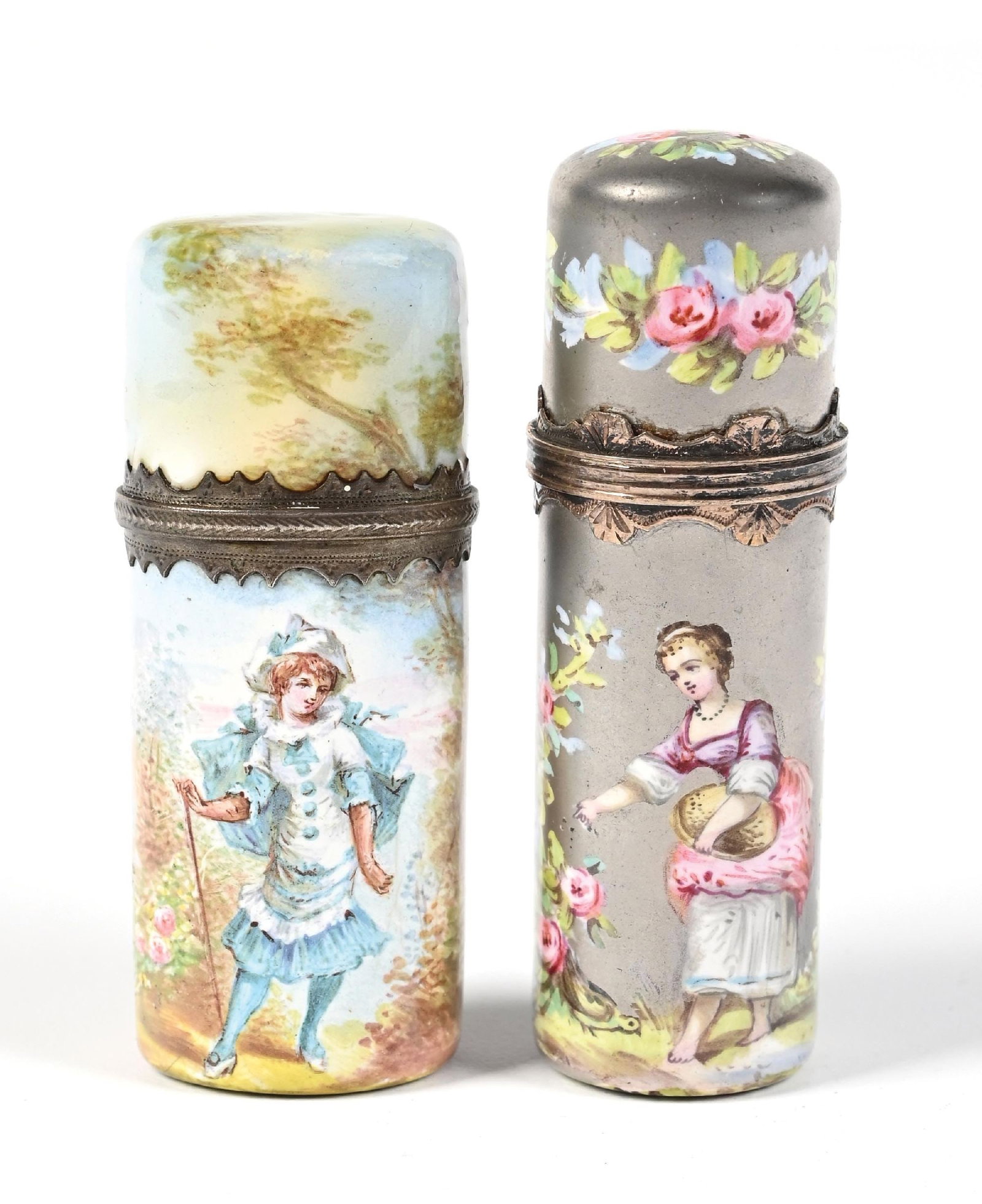 LOT OF 2: FRENCH PORCELAIN & SILVER PERFUME BOTTLES: C. 1800s. A collection of two (one silver-toned metal, one porcelain) rococo-style perfumes featuring female Victorian figurals and floral patterning, both in wonderful condition. Largest: 1" x 3". Co