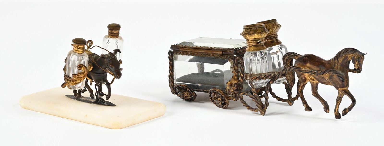 LOT OF 2: DONKEY/HORSE PALAIS ROYAL FRENCH PERFUME BOTTLE STANDS: C. 1800s. (A) A charming French Palais Royal horse-drawn carriage perfume vanity set. The carriage features two clear-glass perfumes with iridescent floral medallions on scalloped-flower-shaped