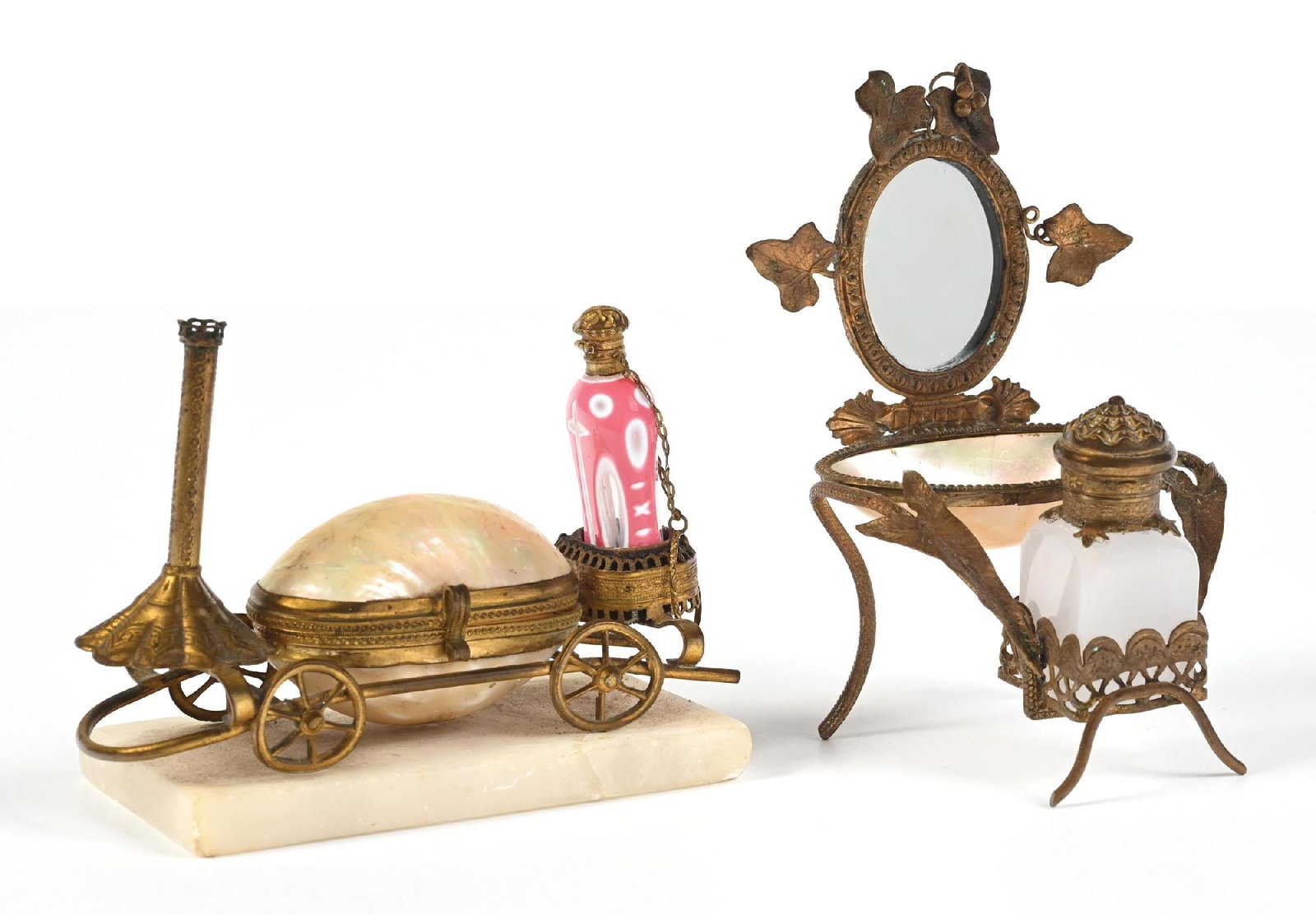 LOT OF 2: FRENCH PALAIS ROYAL MOTHER OF PEARL CARRIAGE PERFUME STAND & MINIATURE VANITY SET: C.1880s. (A) A beautiful Palais Royal French perfume caddy featuring a mother-of-pearl trinket box, a posy holder, and a Châtelaine pink-cut glass perfume. Overall a great vanity set in very good
