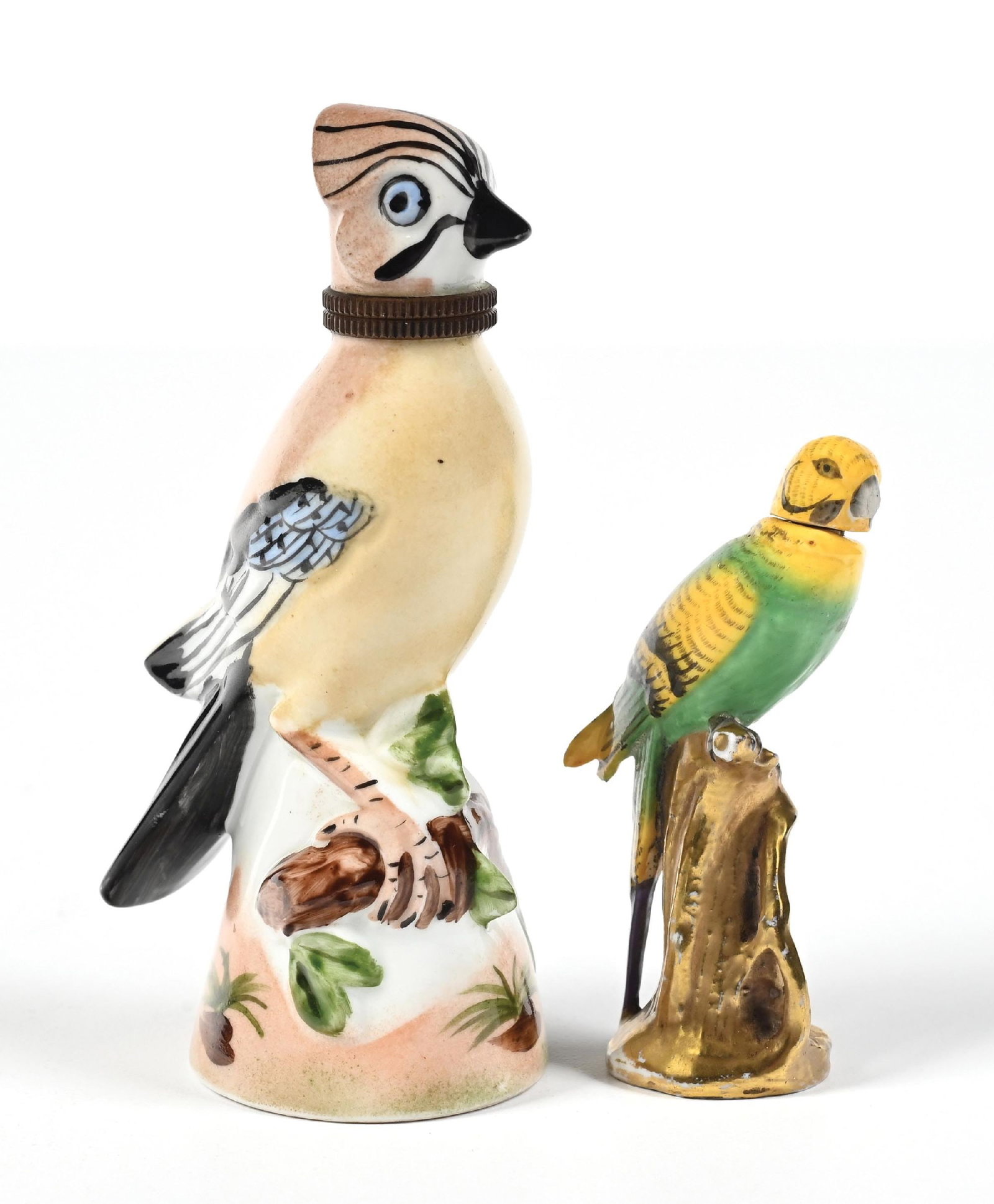 LOT OF 2: FRENCH PORCELAIN BIRD FIGURES: C. 1800s. A pair of porcelain bird perfumes. The larger of the two birds is a French perfume in great condition. The smaller parrot is a (marked with an anchor and another hallmark, likely a Chelsea, 