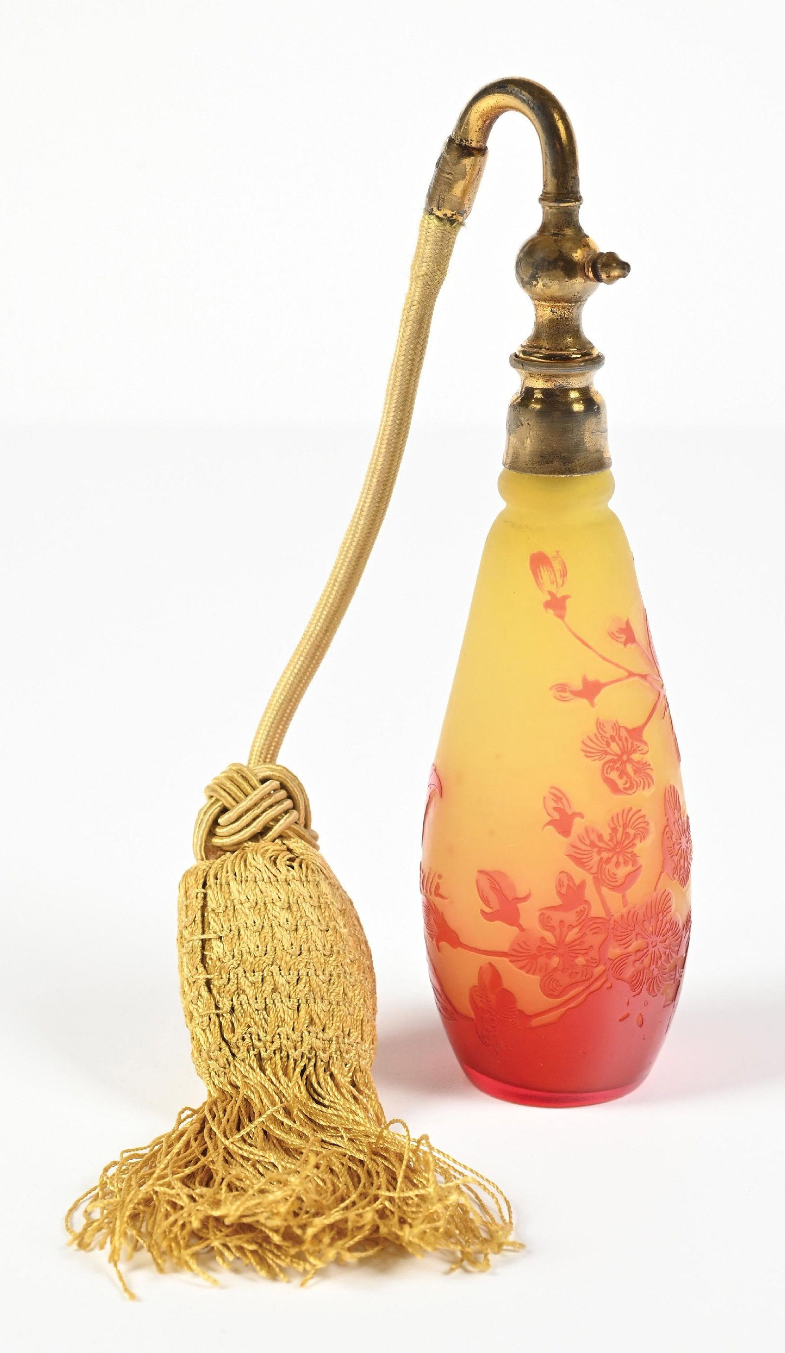 EMILE GALLE PERFUME WITH RED FOLIAGE AND ATOMIZER: C. 1900s. Gorgeous signed Émile Gallé art nouveau cameo glass perfume. Features a red foliage overlay and includes functional atomizer puff. Perfume is in excellent condition. 4" x 2 - 1/4" 
