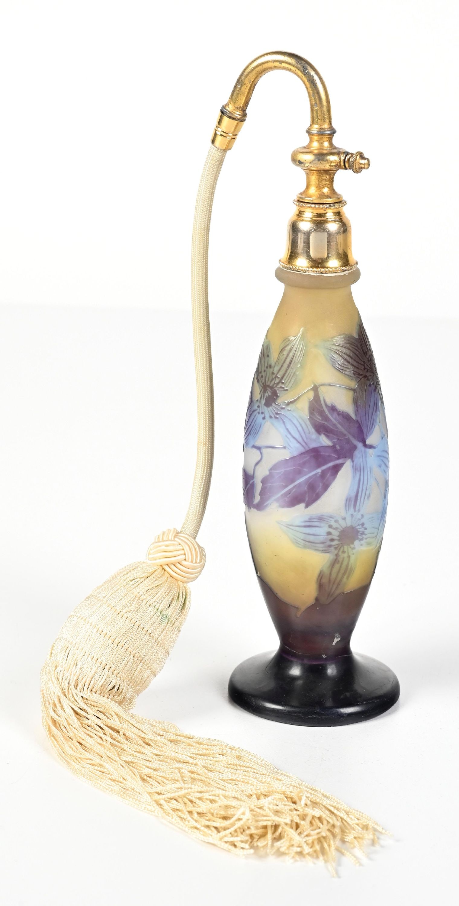 EMILIE GALLE YELLOW AND PURPLE FLORAL PERFUME WITH ATOMIZER: C. 1900s. Fantastic signed Émile Gallé Art Nouveau cameo glass perfume. The perfume features a gorgeous purple floral and foliage overlay. The perfume has a gold metal topper with a function