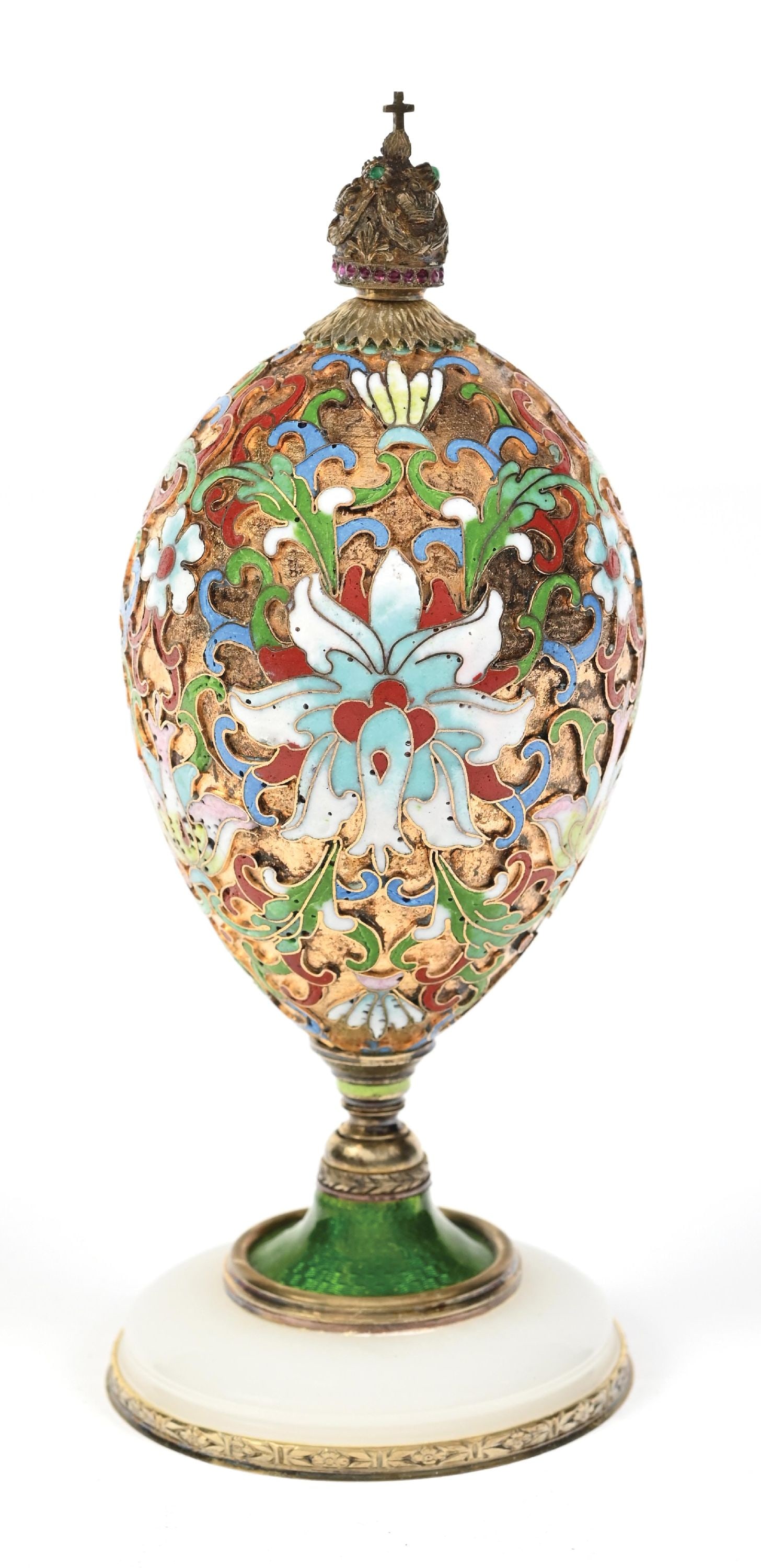 CLOISONNÉ EGG PERFUME BOTTLE: C. 1900s. A beautiful Cloisonné egg with a fantastic, colorful floral enamel over a gold-toned base. The egg perfume is mounted on an opaline, and the Cloisonné stand on a stem with a royal 