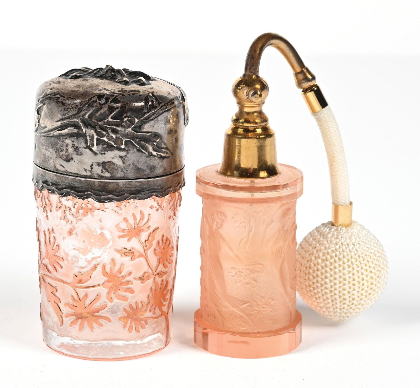 LOT OF 2: DAUM & HOFFMANN PINK GLASS PERFUMES: C. 1800s-1900s. (A) A Daum pink glass perfume decorated with floral and foliage motifs, fitted with a hinged silver lid featuring an embossed floral design. The lid interior has a gold-toned finish, a