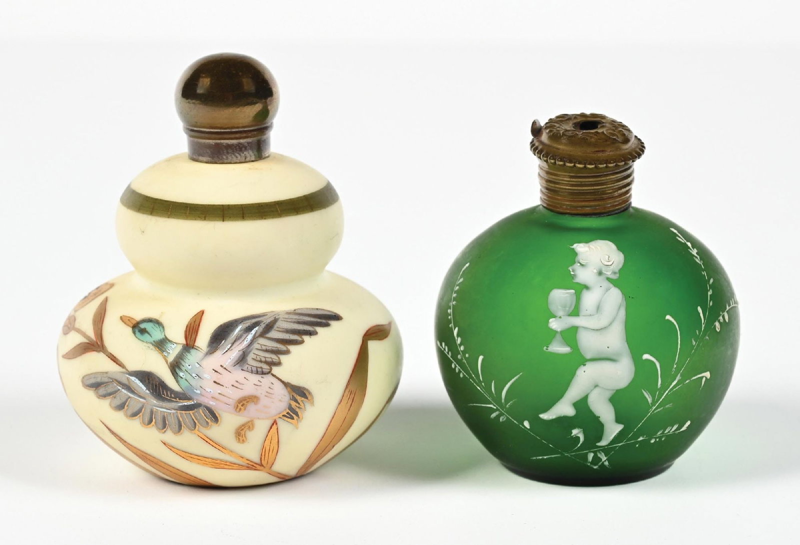 LOT OF 2: HAND PAINTED PERFUME BOTTLES: C. 1900s. (A) A charming matte yellow base perfume decorated with metallic foliage featuring a duck motif. The perfume is in good condition. The base has mild crazing. (B) A beautiful, deep green matt