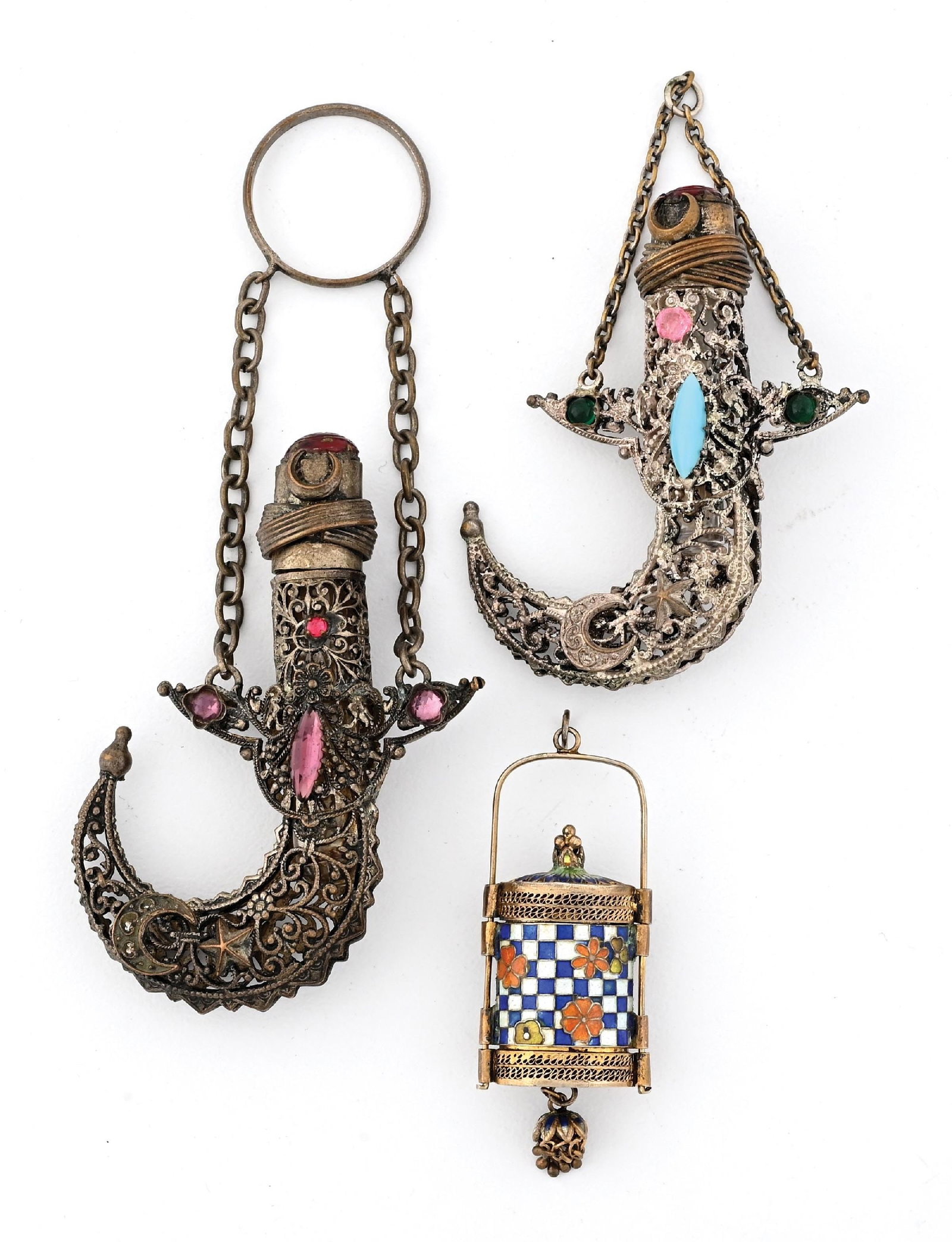 LOT OF 3: MINIATURE PERFUME BOTTLES: C. 1800s. A collection of three highly decorative gilt filigree and enamel châtelaine perfumes, all of which are in great condition. Largest: 2" x 3". Condition: 175 Dimensions: (Very Good).