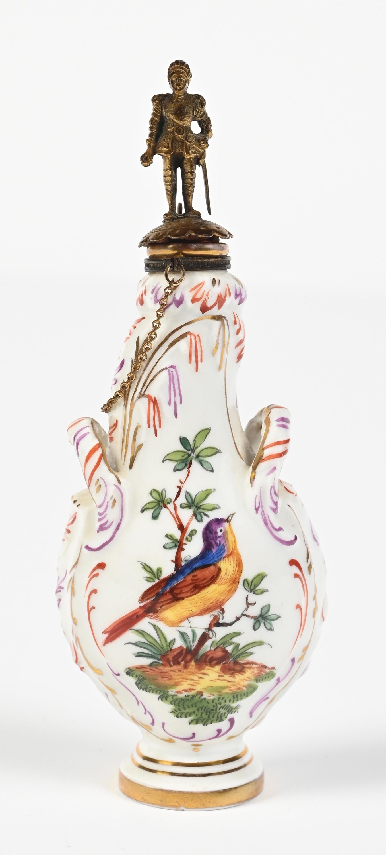 RARE MEISSEN PORCELAIN SCENT BOTTLE WITH FRUIT MOTIF: C. 18th century. A great Carl Thieme Dresden porcelain perfume bottle with floral and bird motifs featuring a gold-toned soldier on the cap. Minor crazing on the base, in great condition. 1" Dia. x 5"