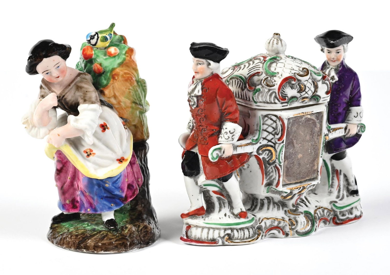 LOT OF 2: PORCELAIN FIGURAL PERFUME BOTTLE & HOLDER: C. 1800s. (A) A porcelain perfume featuring two French men carrying a palanquin-form container, which also serves as a small trinket tray, decorated with ornate scrollwork and patterned detailing. (B)