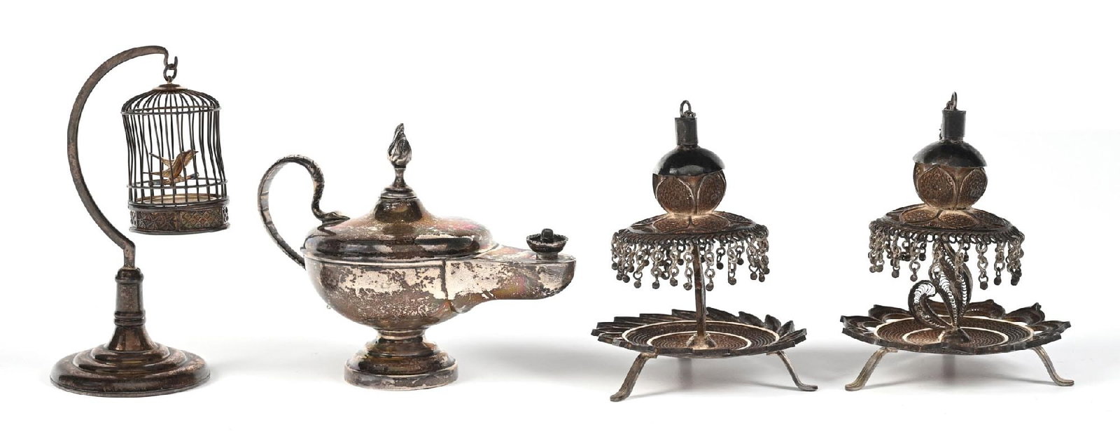 LOT OF 4: SILVER TONE INCENSE BURNERS, BIRD CAGE & TABLE LIGHTER: C. 1800s. A collection of silver metal personal Victorian accessories featuring two filigree perfume incense burners, a sterling silver bird cage, and an English silver miniature perfume kettle. The t