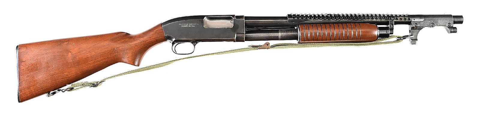 (C) RARE WINCHESTER MODEL 25 SLIDE ACTION TRENCH SHOTGUN RETAILED BY PEACE OFFICER EQUIPMENT CO.: The right side of the frame is marked "PEACE OFFICER EQUIPMENT CO. ST. JOSEPH MO USA". The Model 25 was a "no-frills" shotgun offered by Winchester from 1949 through 1955. Buttstock is marked "K.C.P.D