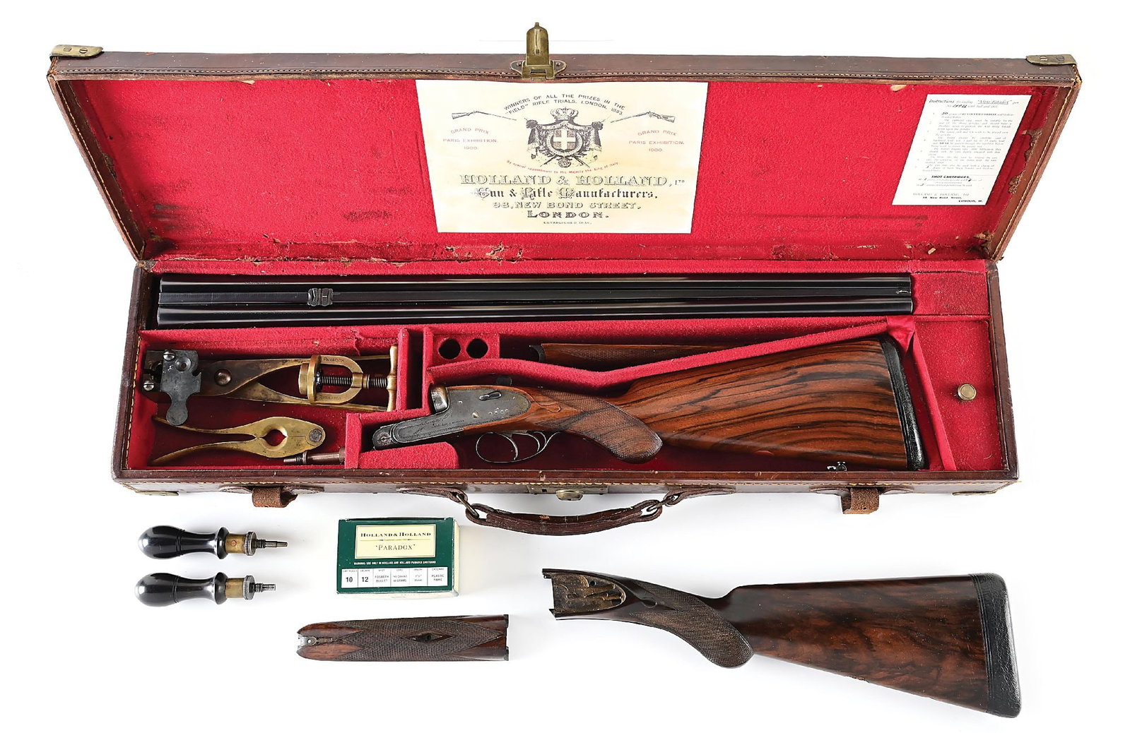 (C) HOLLAND & HOLLAND 12 GAUGE SIDE BY SIDE PARADOX WITH CASE, SOLD TO PRINCE VICTOR KORSCHOUBEY: Made 1913 per included copy of build sheet. Chopper lump barrels made with a diminutive bead front sight screwed into rib at muzzle, on a narrowing matted solid rib, with a two leaf folding rear sight