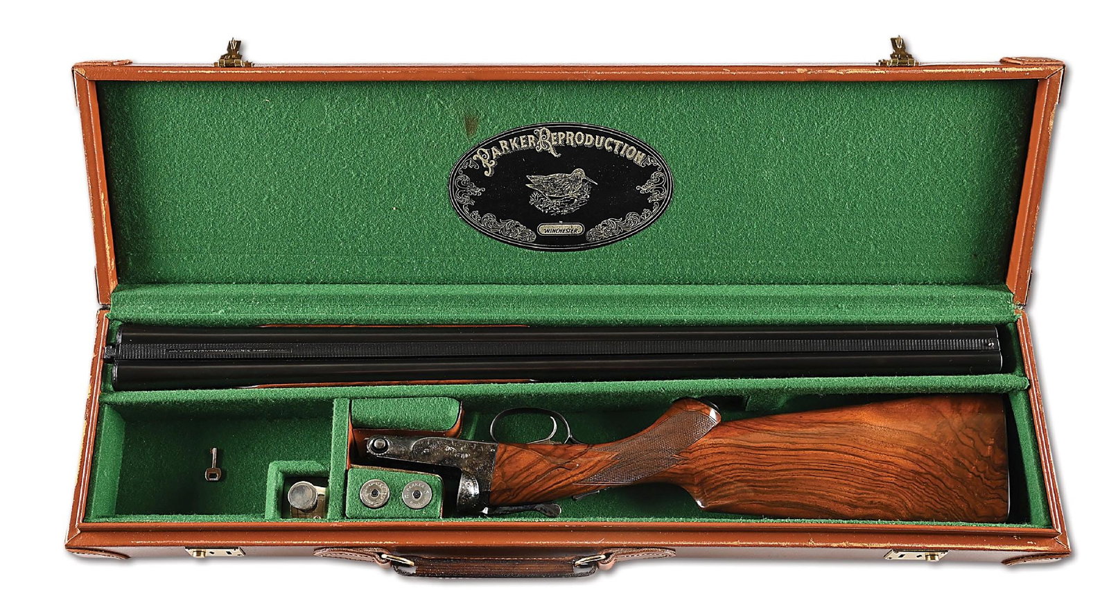 (M) PARKER REPRODUCTIONS DHE 12 BORE SIDE BY SIDE SHOTGUN WITH CASE.: Manufactured under the direction of Winchester as a faithful reproduction of the beloved Parker side by side. Blued barrels with a matted concave rib and single mushroom bead front sight. Barrel addre