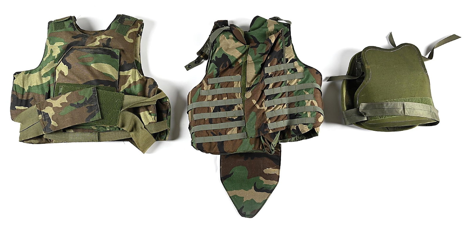 LOT OF 3: US ARMY BODY ARMOR.: Lot consists of: (A) Woodland camouflage PS-930 Ranger Body Armor. Size XL. Date of manufacture 10/03/94. Tag present. Velcro functions. Hard plates present. Scattered wear and blemishes. CONDITION: V