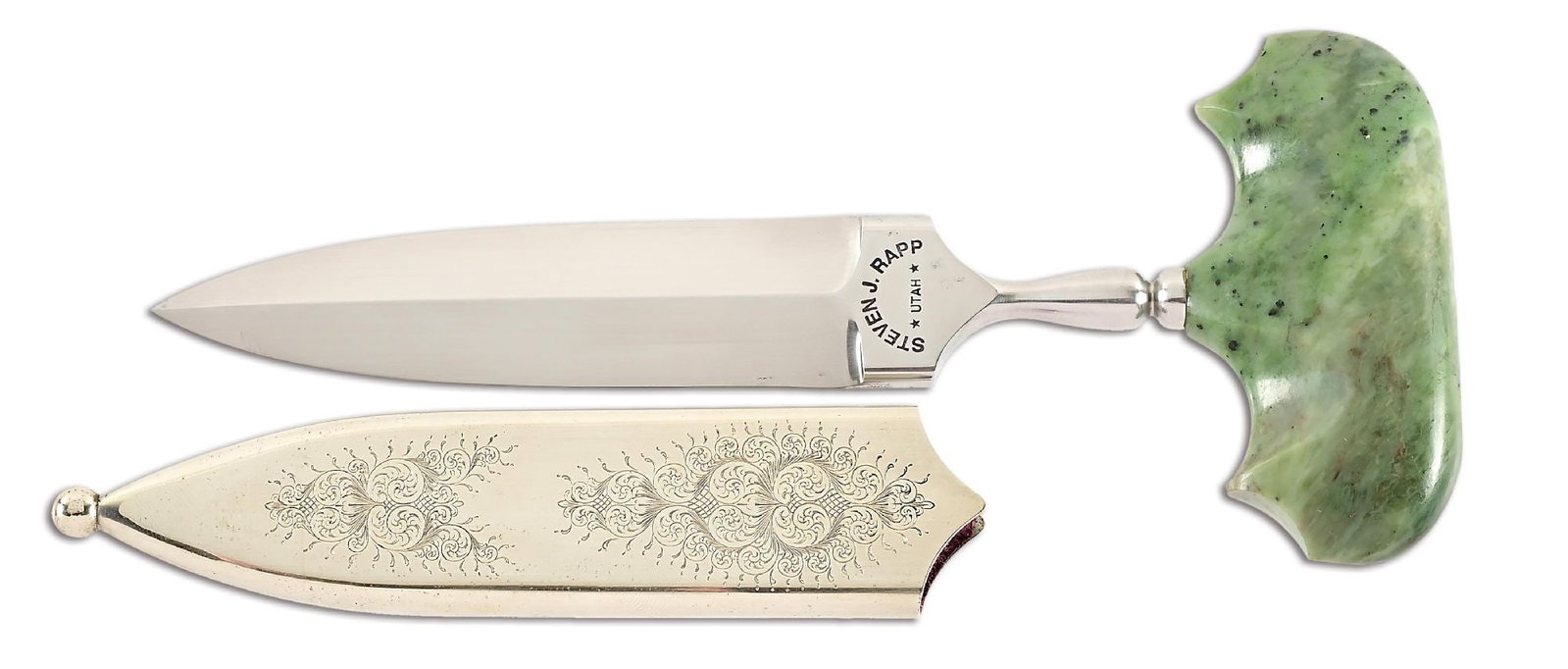 STEVEN RAPP PUSH DAGGER.: Hand rubbed satin finished 440-C dagger blade marked "STEVEN J. RAPP / UTAH" on obverse ricasso. Finger grooved green quartz handle. Mirror finished scabbard with beautiful engraving by Master