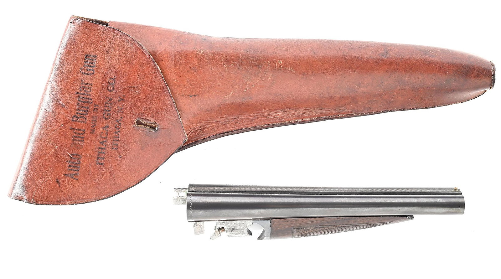 ITHACA AUTO BURGLAR BARRELS AND DESIRABLE ITHACA AUTO BURGLAR HOLSTER.: The Ithaca Auto and Burglar was produced from 1921 through 1934. The earlier examples were built on the Flues frame while the later examples used the NID frames. These barrels are for a first model an
