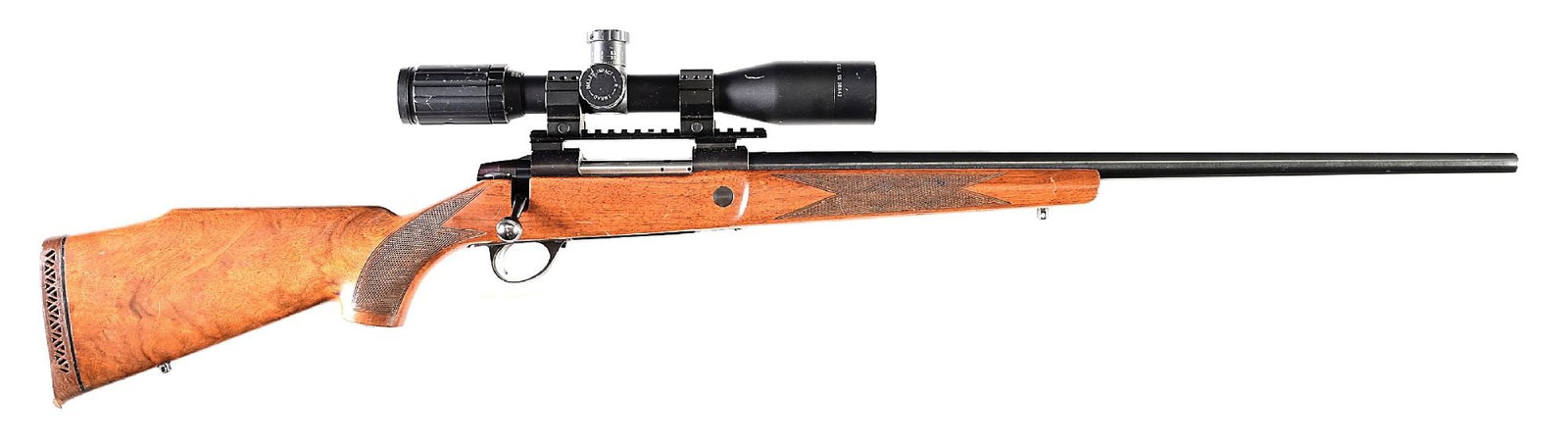 (C) SAKO L61R 25-06 BOLT ACTION RIFLE: Barrel made without provision for iron sights, marked "MADE IN FINLAND" on left side ahead of shank and "SAKO / Cal. .25-06" on top ahead of shank. Left side of receiver with model designation, serial