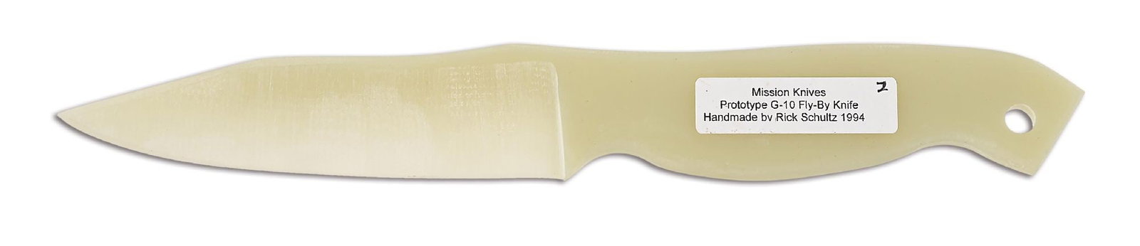 MISSION KNIVES PROTOTYPE FLY-BY KNIFE BY RICK SCHULTZ.: Clip point blade. Full G-10 construction. Handle features a tag that reads "Mission Knives / Prototype G-10 Fly-By Knife / Handmade by Rick Schultz 1994". These knives were sold to different governmen