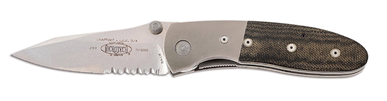 BOXED MICROTECH LIGHTFOOT.: Microtech Lightfoot LCC D/A features a stonewash 154-CM serrated blade marked "LIGHTFOOT L.C.C. D/A" with Microtech logo. Numbered "2161" and dated "11/2000". Bead blasted titanium bolsters with