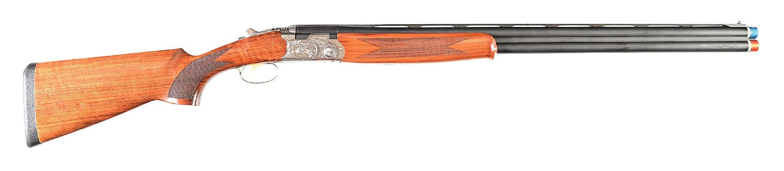 (M) FACTORY ENGRAVED BERETTA SPORTING SILVER PIGEON II 12 GAUGE OVER/UNDER SHOTGUN: This high quality Italian made shotgun is from the famous 680 family. It features the matte blued barrels with vent rib and dual sights. The coin silver frame is beautifully engraved with mallards on 