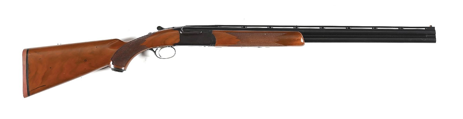 (M) RUGER RED LABEL 20 GAUGE OVER UNDER SHOTGUN.: Dates to 1981. This classic over under was introduced in 1978. It features the rich blue finish, vent rib, dual bead sights, straight comb walnut stock with checkered pistol grip, red eagle cap, Ruger
