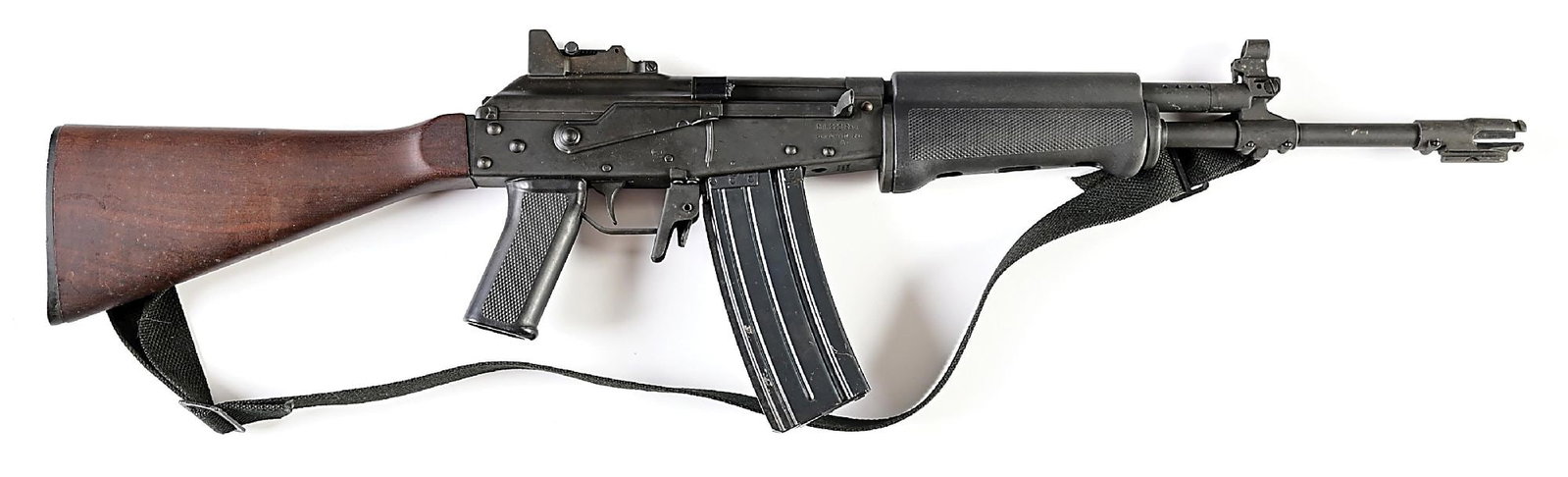 (M) VALMET M76 .223 REMINGTON SEMI-AUTOMATIC RIFLE: Based on the RK62, the Valmet M76 was among the first AK pattern arms imported into the United States. This example marked with a Valmet import mark ahead of magazine well, typical Valmet legends thro