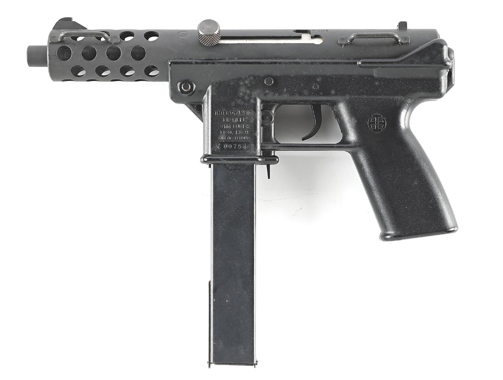 (M) PRE-BAN OPEN BOLT INTERDYNAMIC KG-9 SEMI-AUTOMATIC PISTOL.: The precursor to the iconic Tec-9 pistol, this open bolt semi-auto pistol features a matte finished shrouded barrel, fixed iron sights, and a polymer grip frame. Approximately 2,500 were produced prio