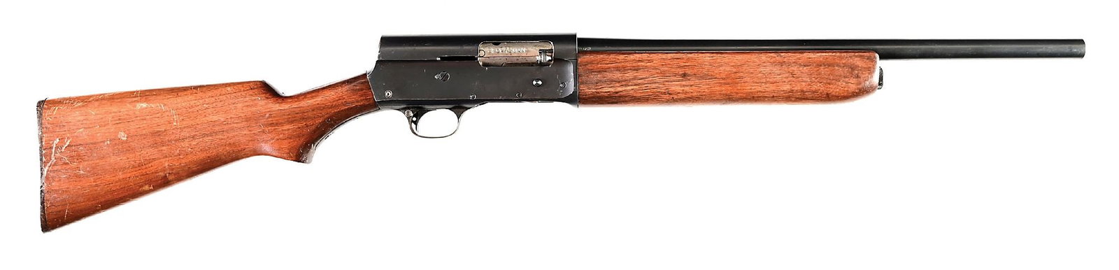(C) US REMINGTON MODEL 11 SEMI-AUTOMATIC RIOT SHOTGUN.: This mid-war gun dates to 1943. The frame is stamped "MILITARY FINISH" along with US and Ordnance bomb. The top barrel breech is also stamped US with bomb. Shotgun features the plain walnut stock with