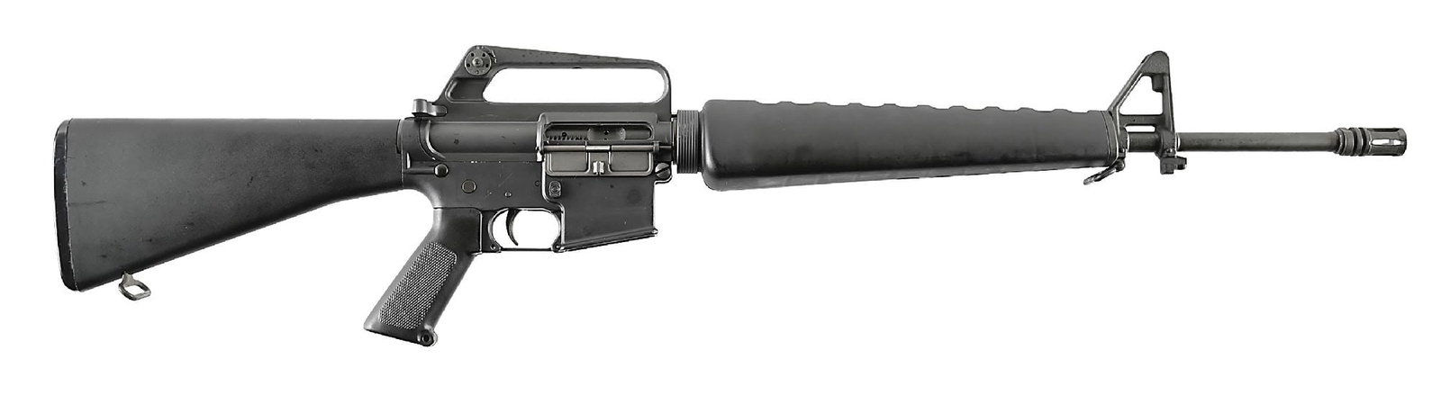 (C) COLT SP1 AR-15 SEMI-AUTOMATIC RIFLE (1975).: Manufactured in 1975. Gray parkerized pencil barrel marked "C MP CHROME BORE" with bird cage flash hider. Protected post front sight on triangle base with bayonet lug. Slick side carry handle upper wi
