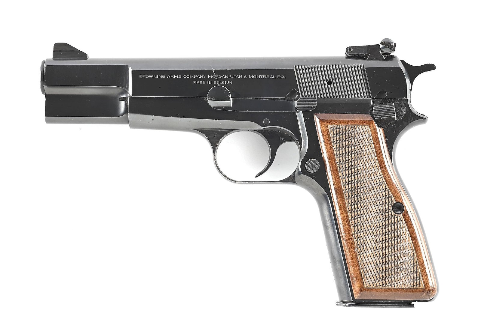 (M) BROWNING HI POWER TARGET SEMI-AUTOMATIC PISTOL.: Belgium made target version of the classic Hi-Power with the dovetailed adjustable rear sight, high blade on base front sight, blue finish, and checkered walnut grips. CONDITION: Excellent. Retains ma