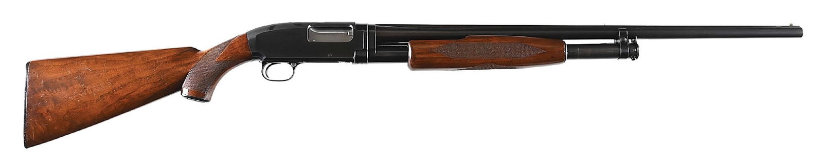 (C) SKEET GRADE WINCHESTER MODEL 12 20 GAUGE SLIDE ACTION SHOTGUN.: Manufactured in 1941. Blued Winchester proof steel barrel with matted rib, white Bradley style front sight, and mid rib bead. Blued takedown frame marked "SKEET" and "W" on the underside and matted on