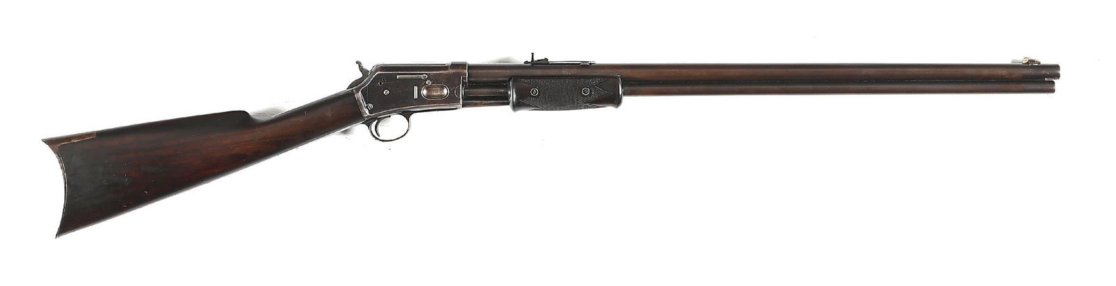 (A) FINE COLT LIGHTNING MEDIUM FRAME SLIDE ACTION RIFLE IN .32-20.: Dates to 1890. Standard rifle features the blue finish, round barrel, full length magazine tube, dovetailed German silver knife blade front sight, semi-buckhorn rear sight, and walnut stock with rifle