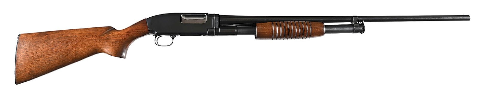 (C) FINE WINCHESTER MODEL 12 20 GAUGE SLIDE ACTION SHOTGUN.: Manufactured in 1961. Classically configured for the period with blued finish, Winchester proof steel barrel, single steel bead sight, takedown frame, wide corrugated walnut forend, and walnut stock w