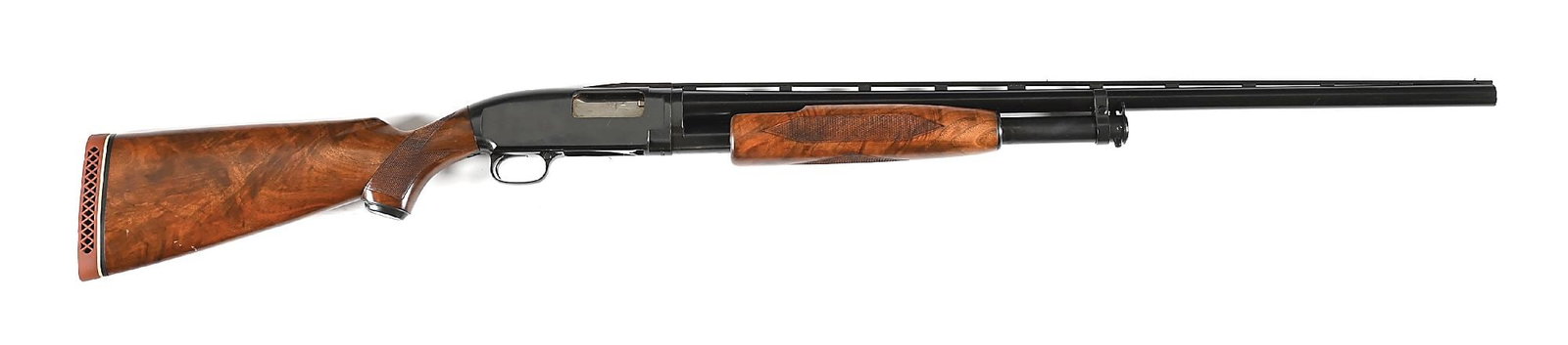 (C) FINE WINCHESTER DELUXE MODEL 12 SLIDE ACTION 12 GAUGE SHOTGUN (1971): Dates to 1971. Features the vent rib with off set PW with dual tone blue finish, dual bead sights, checkered walnut stock with pistol grip, red W grip cap, straight comb, red Winchester waffle recoil 