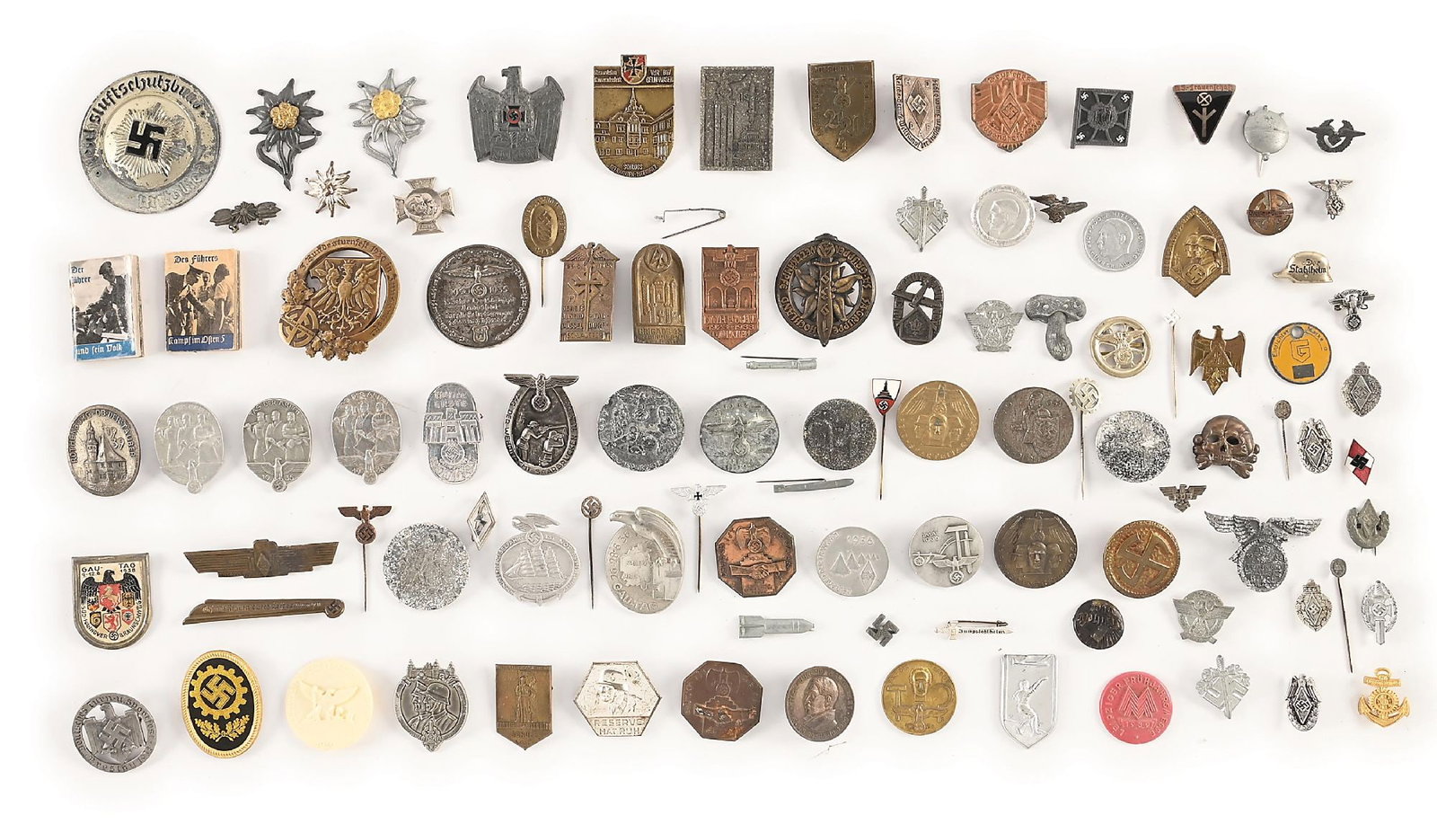 LARGE LOT OF MISCELLANEOUS THIRD REICH TINNIES.: Large lot of miscellaneous Third Reich tinnies. Lot consists of mainly tinnies representing NSDAP political organizations, but also includes a Panzer wrap uniform skull and HJ pin, etc. CONDITION: Ove