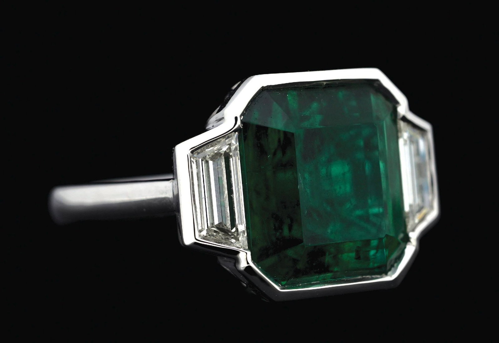 PLATINUM 11.37CT EMERALD & DIAMOND RING W/REPORT: Platinum emerald (11.37ct) and diamond (0.80ctw) ring accompanied by an original AGL prestige gemstone report and a GGA appraisal report with an ERRV of $332,290.00. (See additional website images for