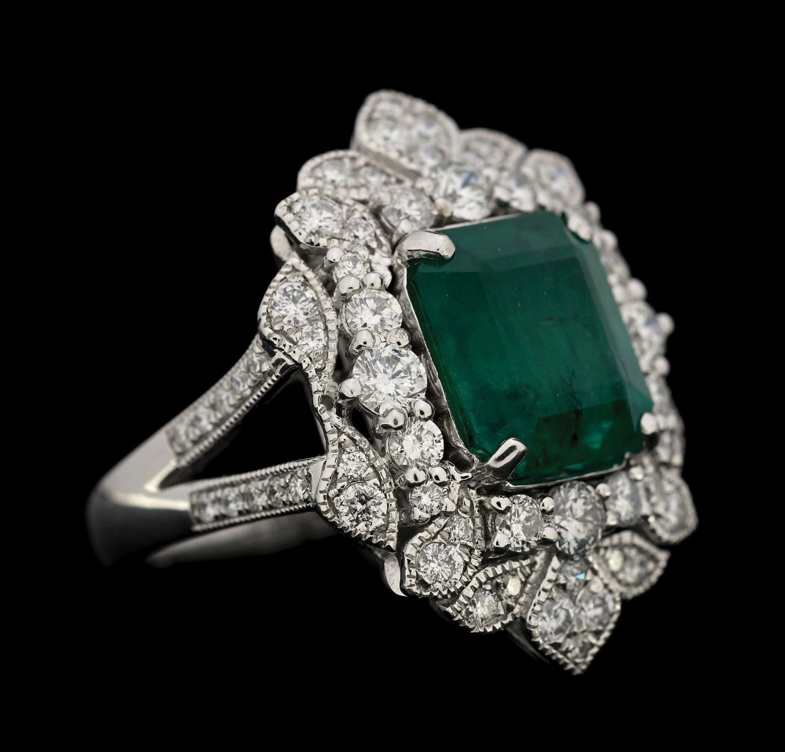 PLATINUM EMERALD & DIAMOND RING W/GIA REPORT: Platinum emerald (4.87ct) and diamond (1.44ctw) ring accompanied by an original GIA emerald report and an AILG appraisal report with an ERRV of $36,875.00. (See additional website images for report sp