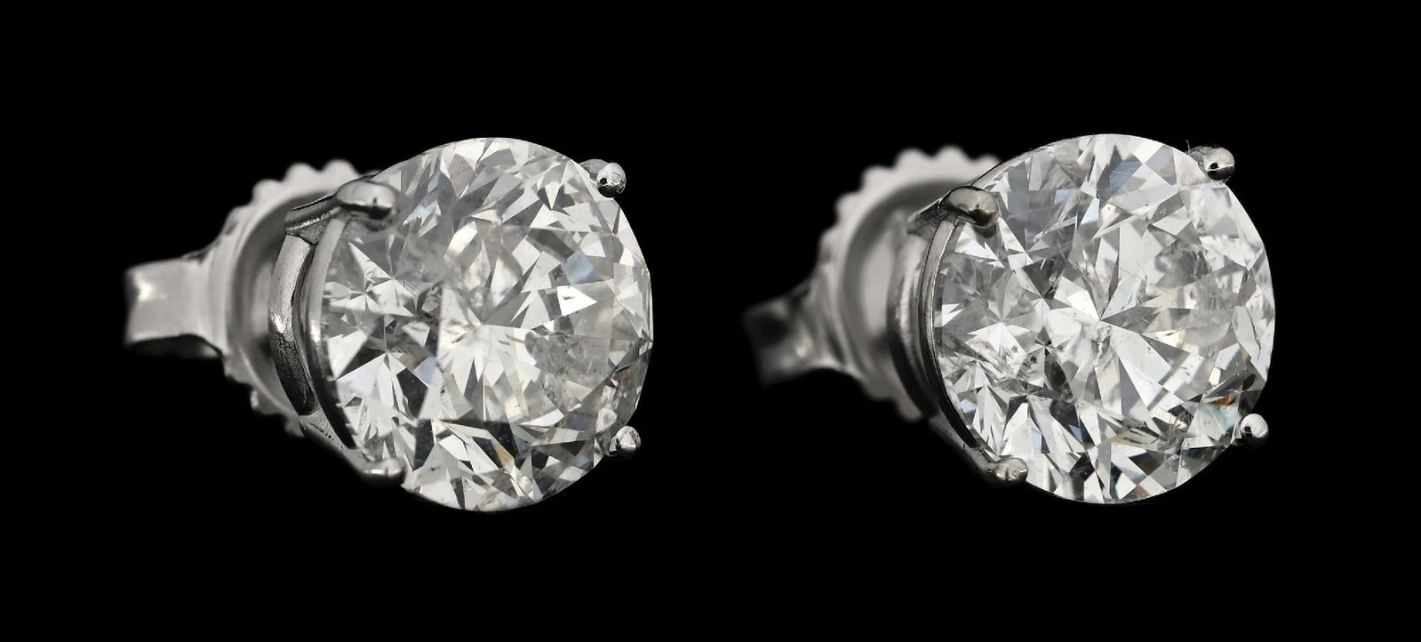14K WHITE GOLD 4.08CT TW DIAMOND STUD EARRINGS W/REPORT: 14k white gold diamond (4.08ctw) stud earrings accompanied by an original GGA appraisal report with an ERRV of $51,830.00 (See additional website images of report for specifications). Marked "14K". Co