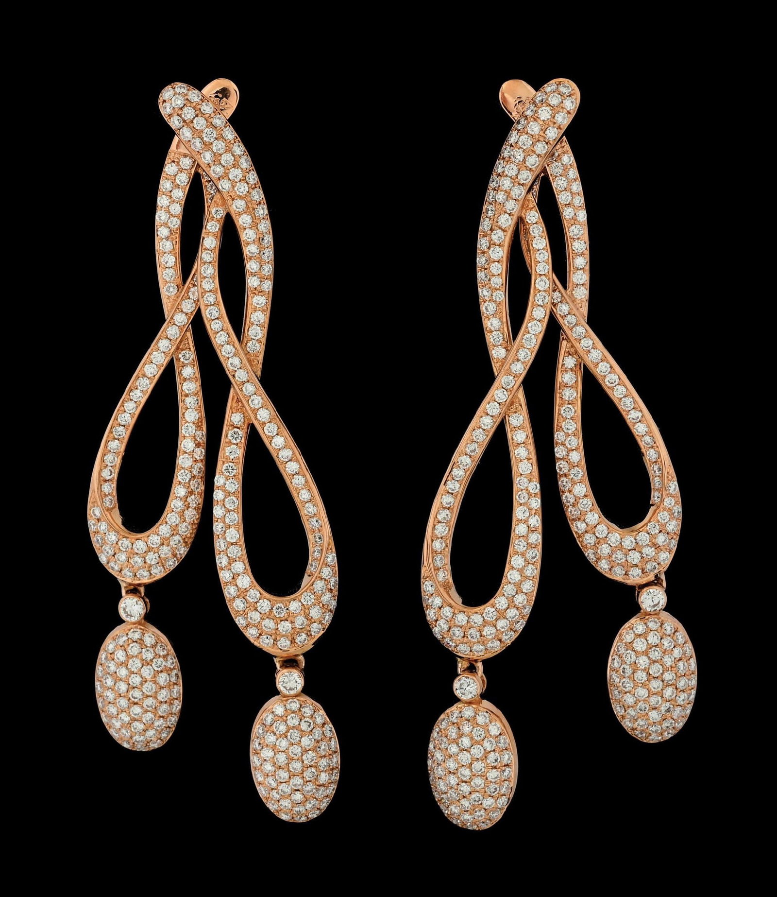 18K ROSE GOLD PAVE-SET DIAMOND DROP EARRINGS, 3.60CT TW: 18k rose gold diamond drop earrings consisting of 590 pave-set round brilliant cut natural diamonds with a total weight of 3.60cts. Length measures 2-1/8". Second drop is removable. Width measures 9mm