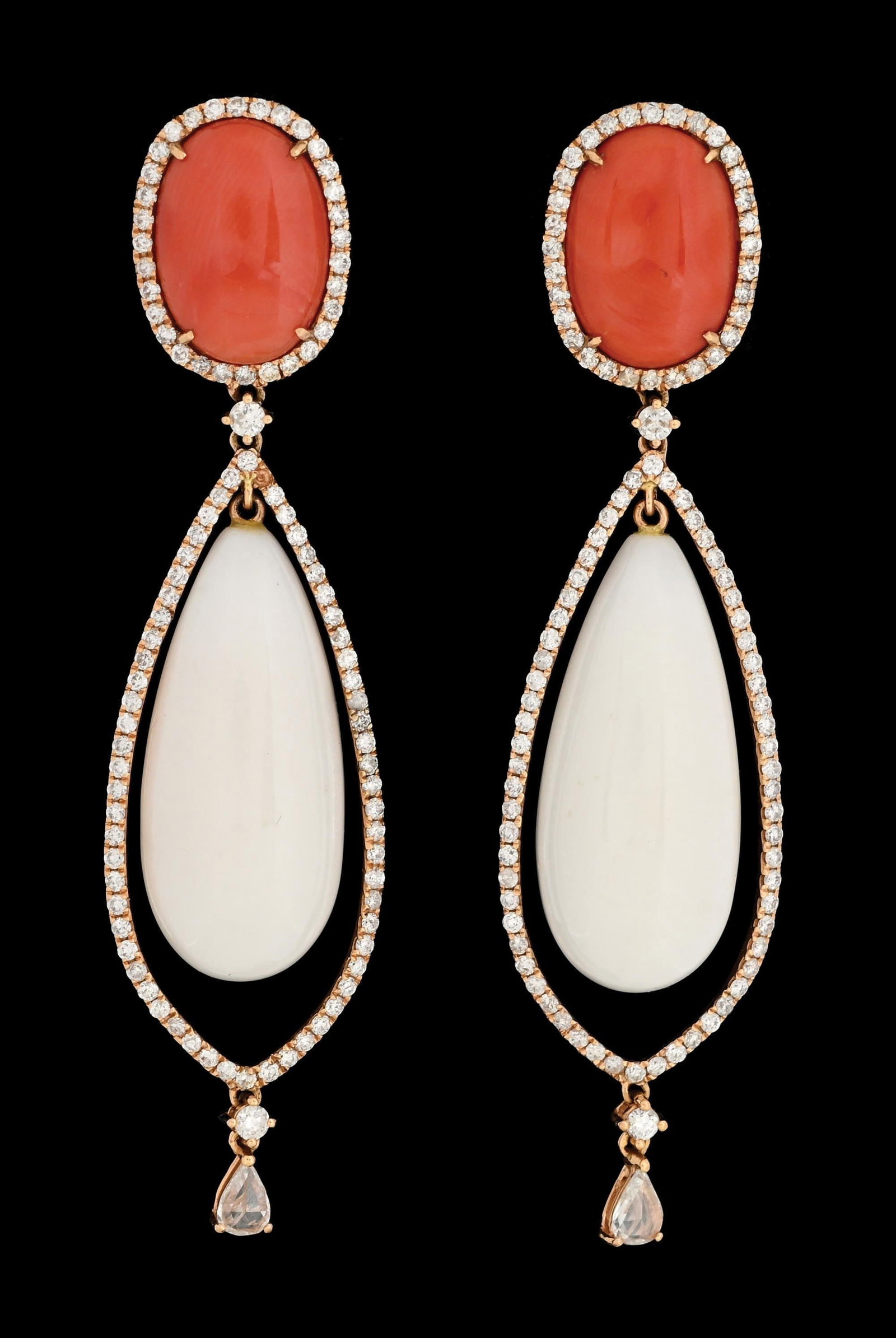 18K PINK GOLD CORAL & DIAMOND DROP EARRINGS: 18k pink gold coral and diamond drop earrings set with pave-set halo's of round brilliant cut natural diamonds and 2 French cut diamond tear drops. Length measures 2-5/8". Width at widest point measur