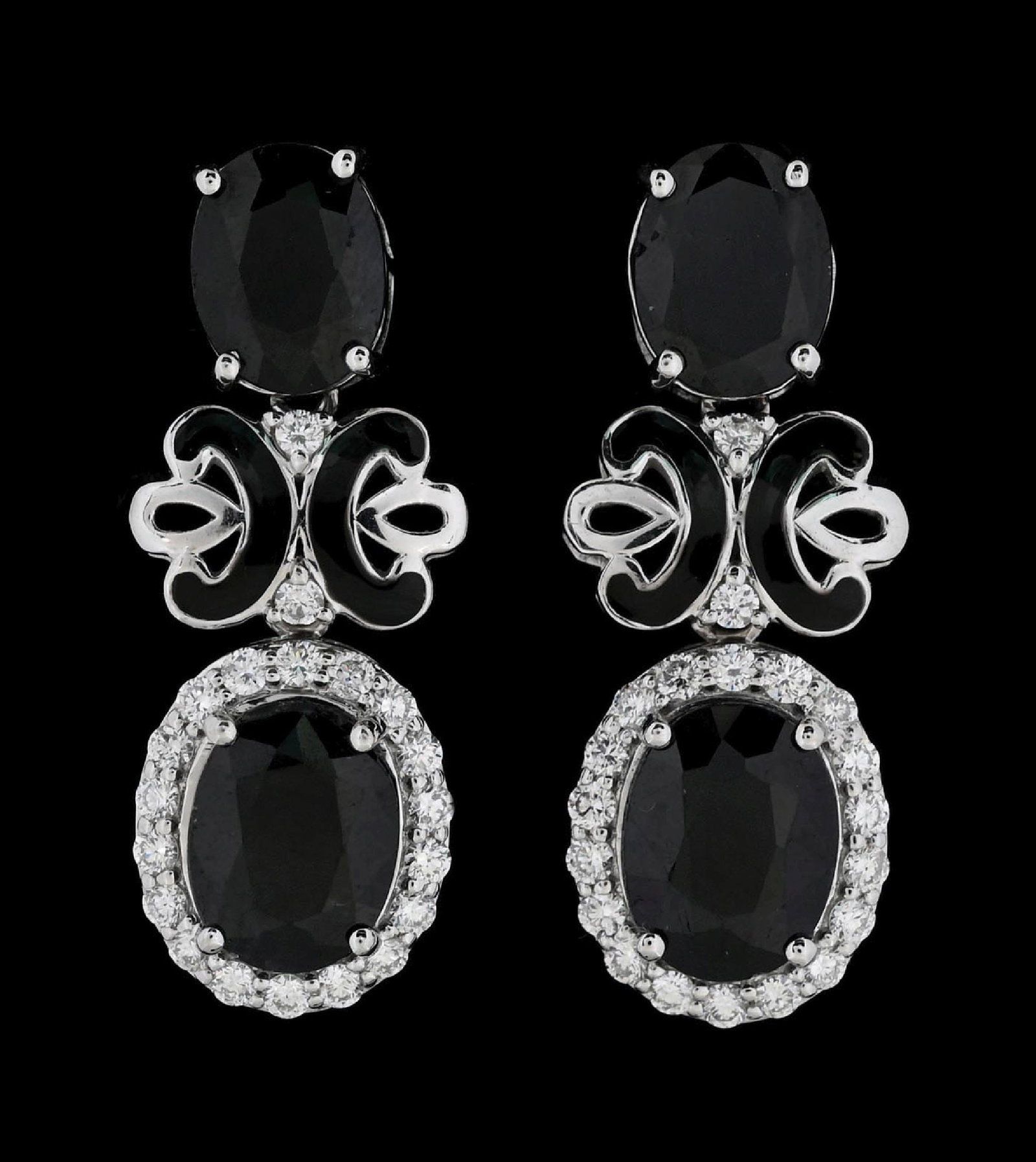 18K WHITE GOLD SAPPHIRE & DIAMOND EARRINGS W/REPORT: 18k white gold sapphire (7.60ctw) and diamond (0.53ctw) enameled drop earrings accompanied by an original AIGL appraisal report with an ERRV of $9,250.00. (See additional website images for report spe