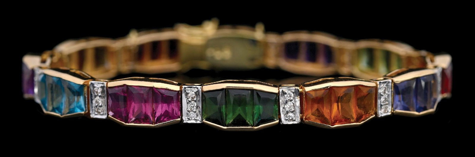 14K YELLOW GOLD MULTI-COLOR GEMSTONE & DIAMOND BRACELET: 14k yellow gold multi-color semi-precious gemstone and diamond bracelet consisting of 36 mixed cut gemstones with a total weight of 25.00cts and 36 round cut near-colorless natural diamonds with a tot