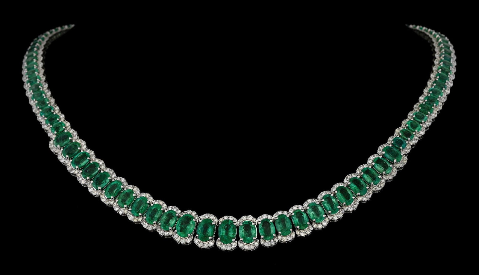 PLATINUM EMERALD & DIAMOND NECKLACE W/REPORT: Platinum emerald (41.98ctw) and diamond (7.76ctw) necklace accompanied by an original GGA appraisal report with an ERRV of $133,570.00. (See additional website images for report specifications). Lengt