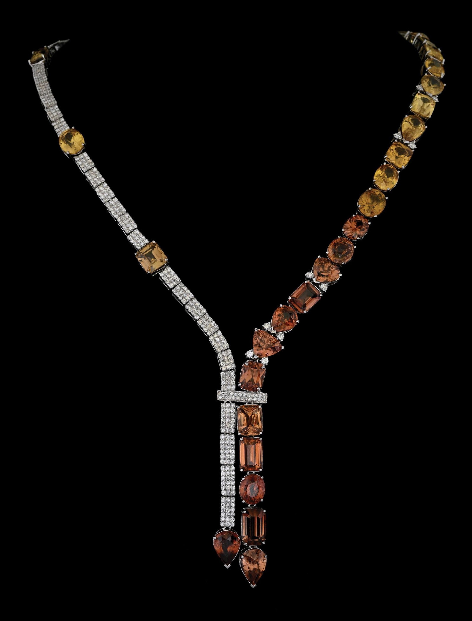 PLATINUM GOLDEN ZIRCON & DIAMOND NECKLACE W/REPORT: Platinum golden zircon (134.90ctw) and diamond (4.84ctw) statement necklace accompanied by an original AIGL appraisal report with an ERRV of $94,880.00. (See additional website images for report speci
