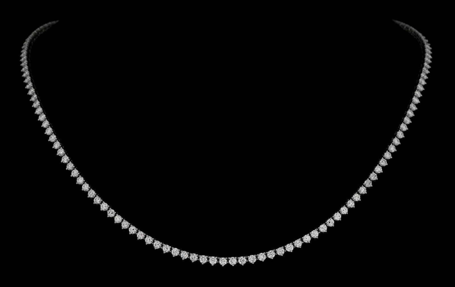 PLATINUM & DIAMOND NECKLACE, 7.65CT TW: Platinum and diamond line necklace consisting of 146 round brilliant cut natural diamonds with a total weight of 7.65cts. Length measures 17". Width at center measures 3mm. Gross weight is 29.0 grams.