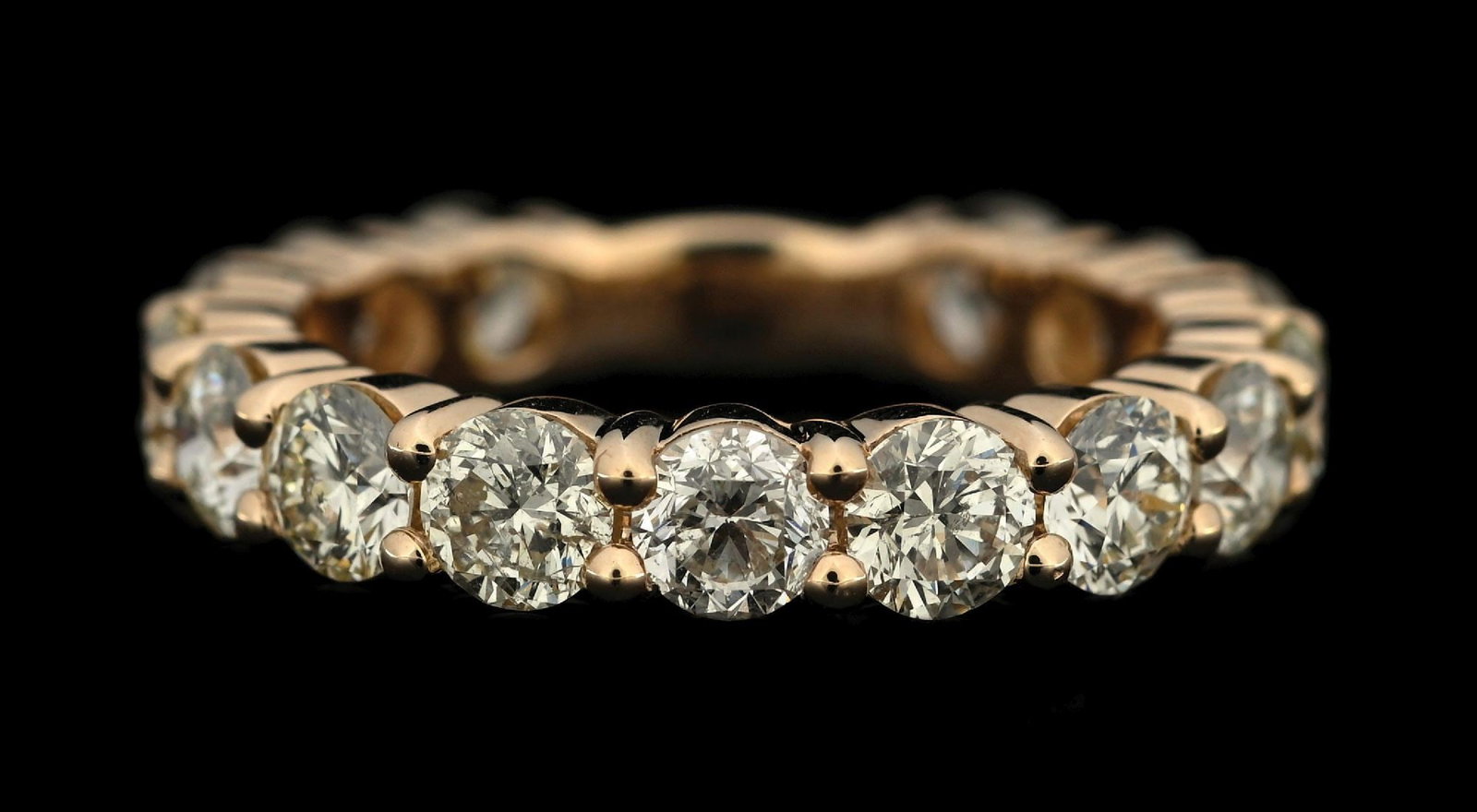 14K YELLOW GOLD 3.40CT TW DIAMOND BAND W/REPORT: 14k yellow gold diamond (3.40ctw) wedding/anniversary band accompanied by an original AIGL appraisal report with an ERRV of $15,870.00. (See additional website images for report specifications). Ring 